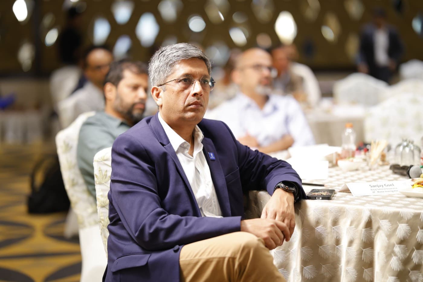 Mumbai · attentive leaders around the table